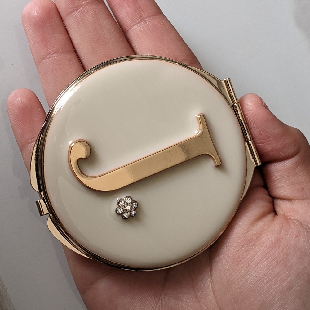Custom compact mirror with J initial